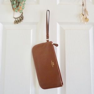 NWOT Coach cognac wristlet